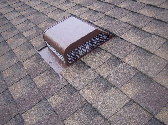 Image of a boxy slantback roof vent.