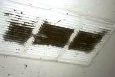 Image where a soffit vent was removed to reveal that there was no hole cut behind it.